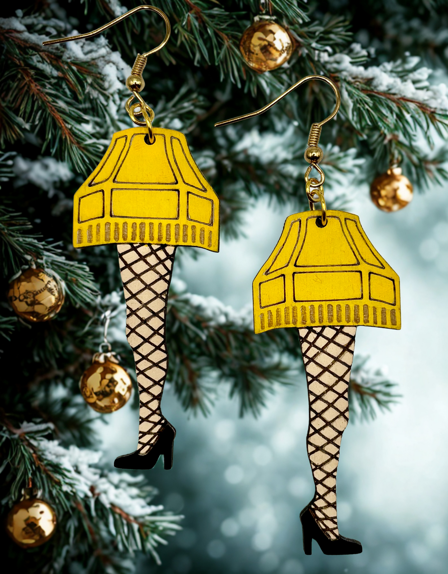 Fragile Leg Lamp Earrings. Adorable Christmas themed earrings featuring hypoallergenic hooks for sensitive ears.