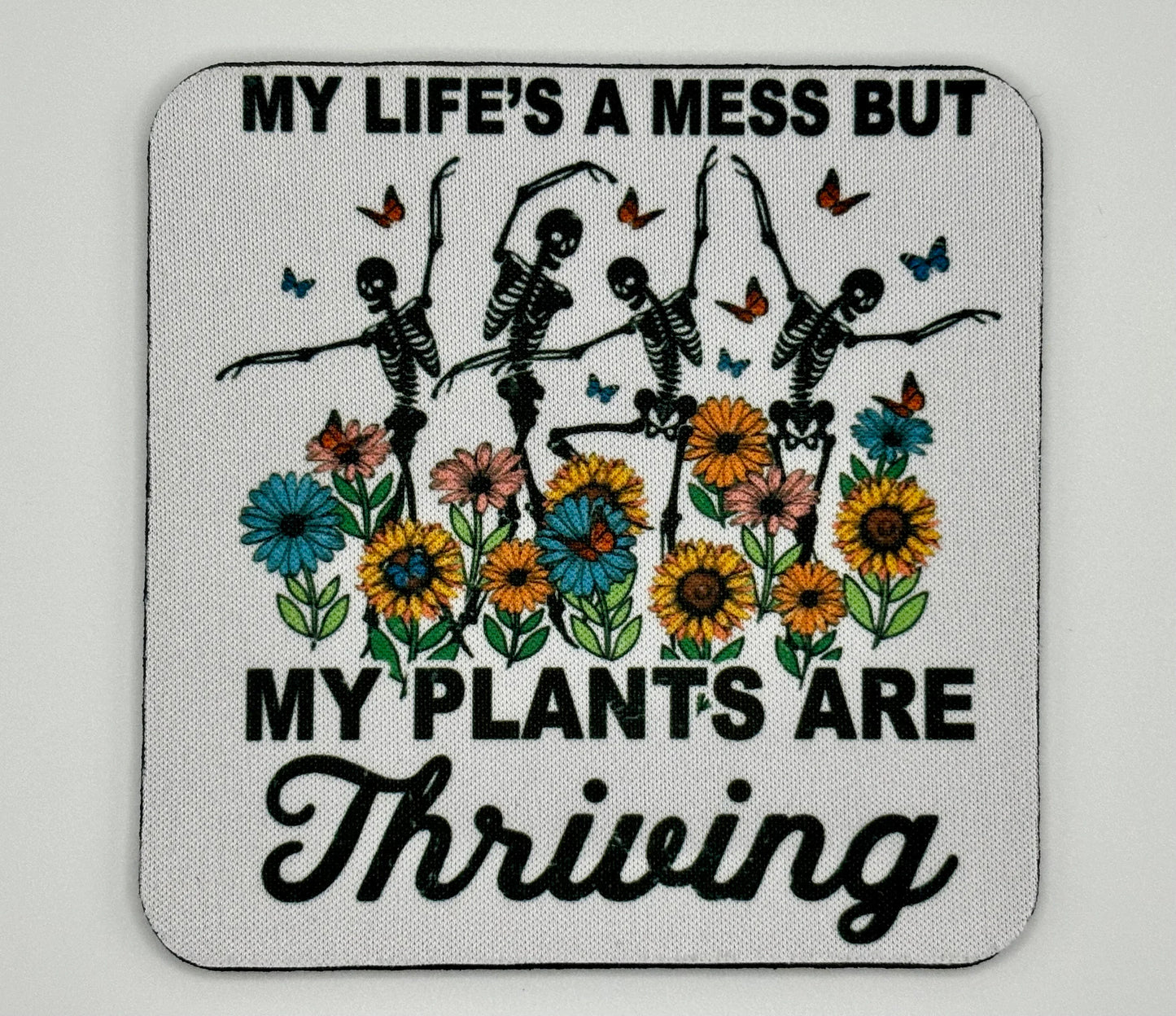 Gothic Chic: Set of 4 Coasters Featuring Plants and Skeletons - A Conversation Starter!